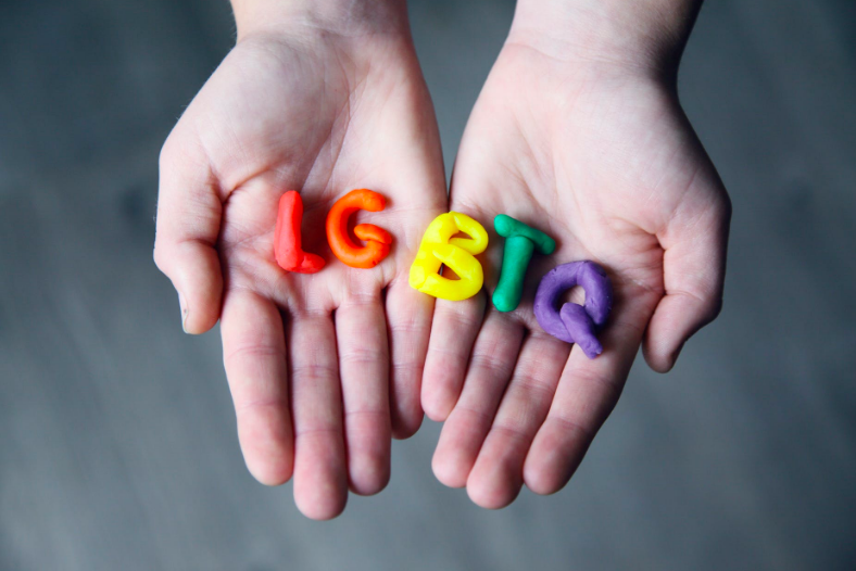 An LGBTQ+ sign.