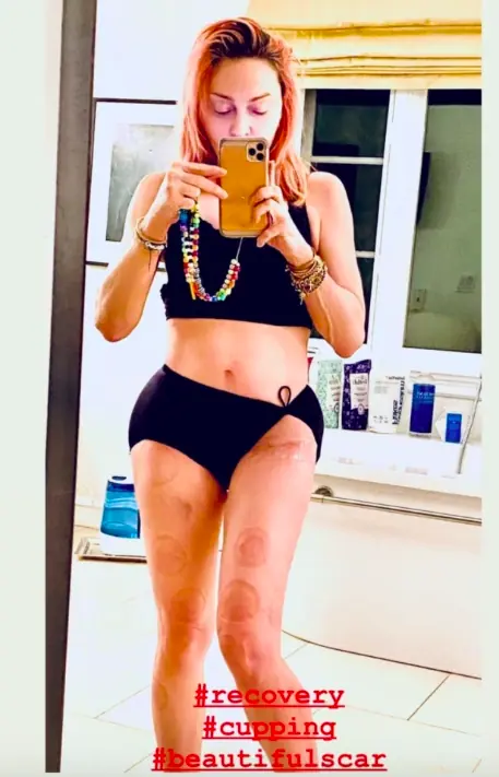 Madonna taking a selfie.