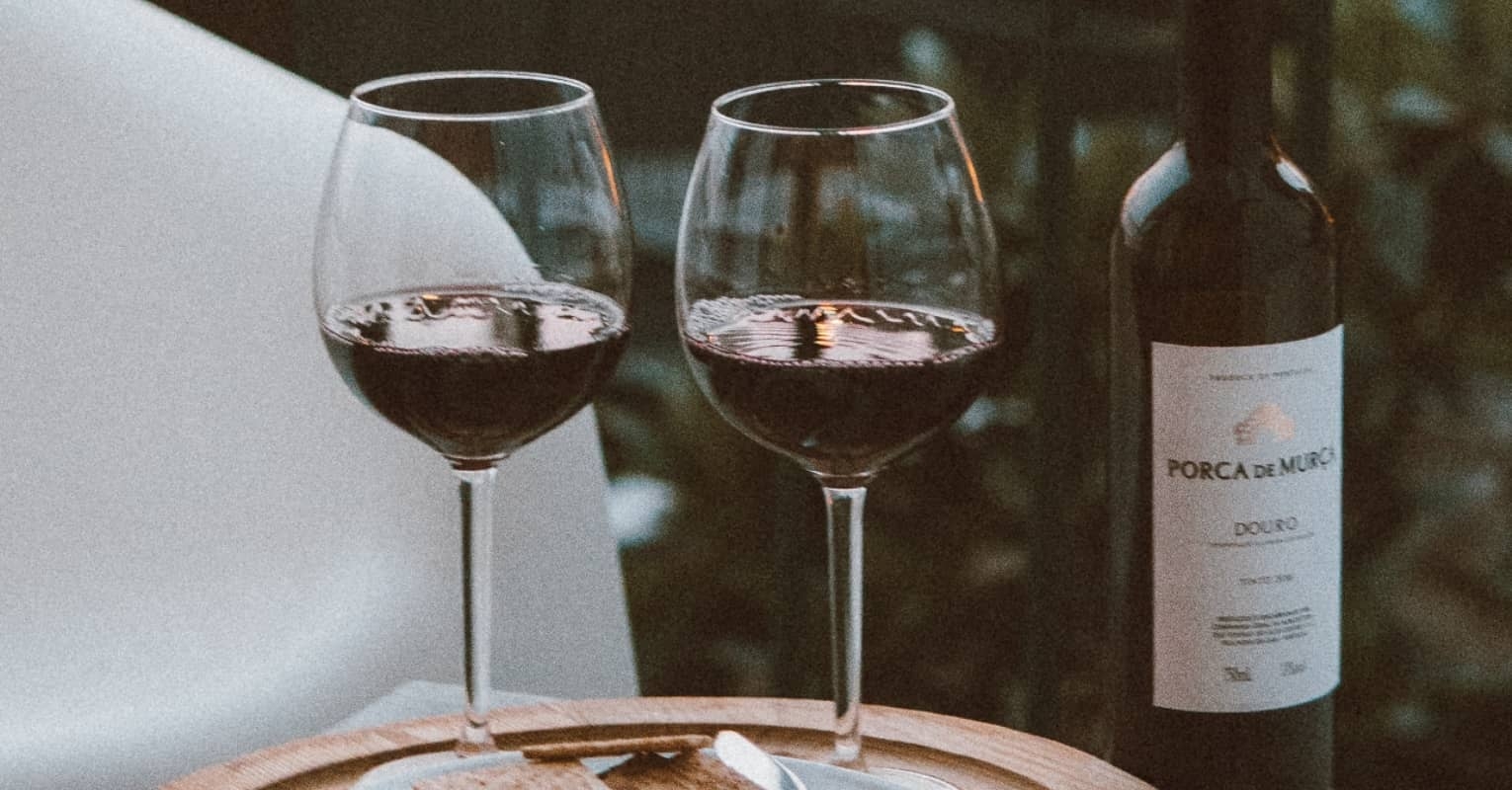 Two glasses of red wine.