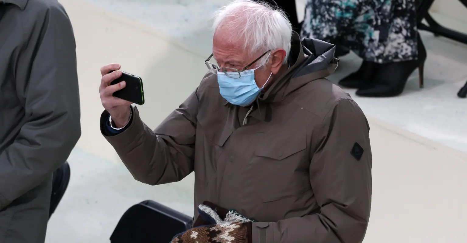 Bernie Sanders reacts to memes of himself wearing coat and mittens after Biden inauguration
