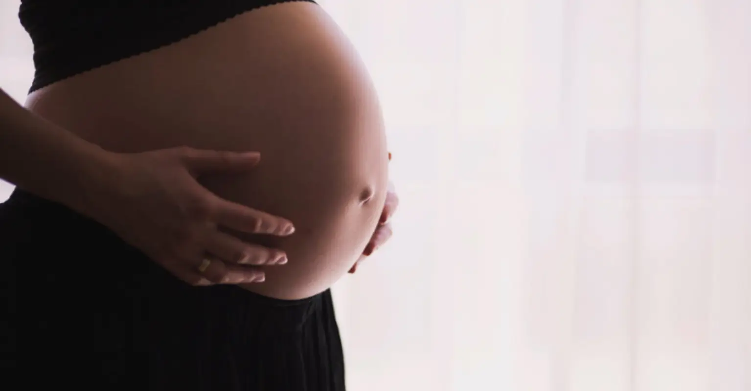 Mom shares staggering baby bump size difference with son compared to triplets