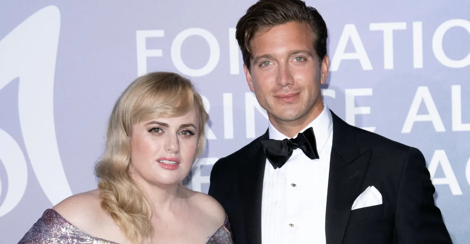 Rebel Wilson flaunts 60lbs weight loss in plunging skintight dress as it's revealed she 'dumped ex Jacob Busch by text'