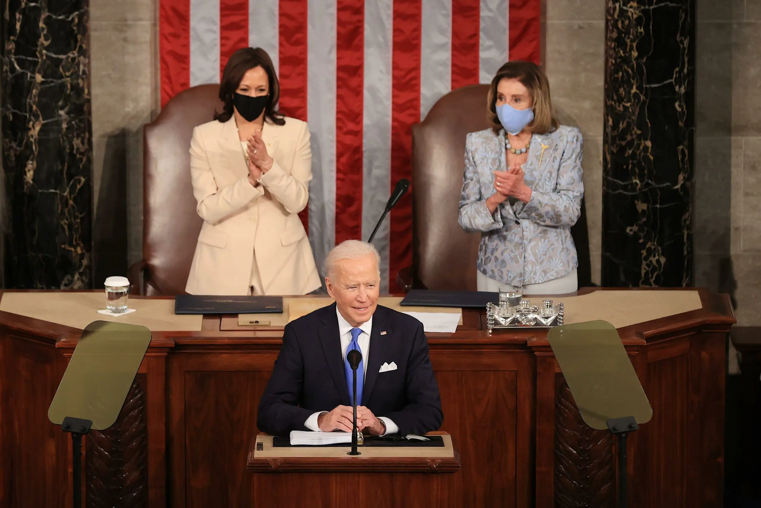 Kamala Harris and Nancy Pelosi make history as first two women to sit behind president during Congress speech