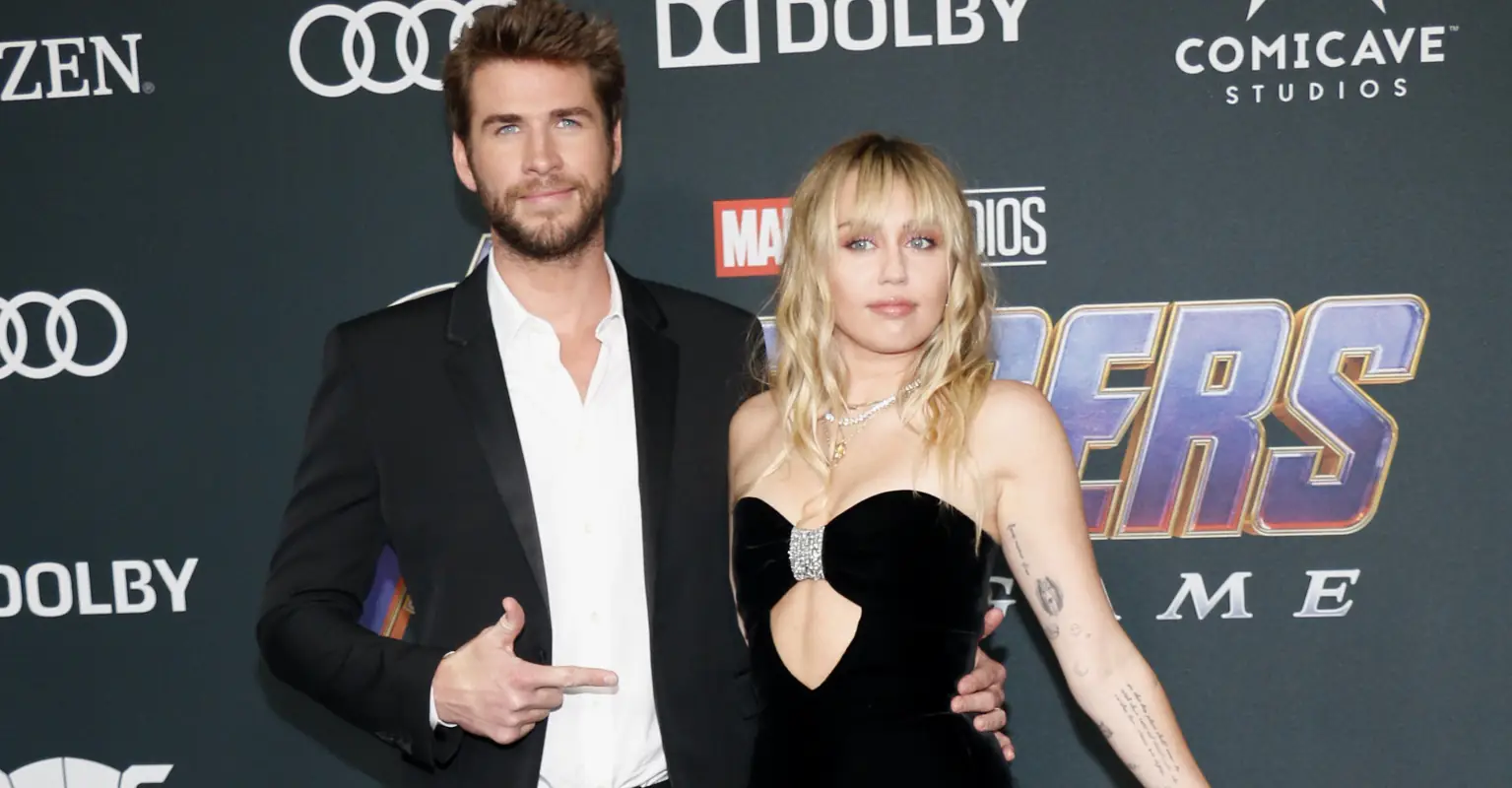 Liam Hemsworth visibly cringes as Miley Cyrus twerks on the red carpet months before their split