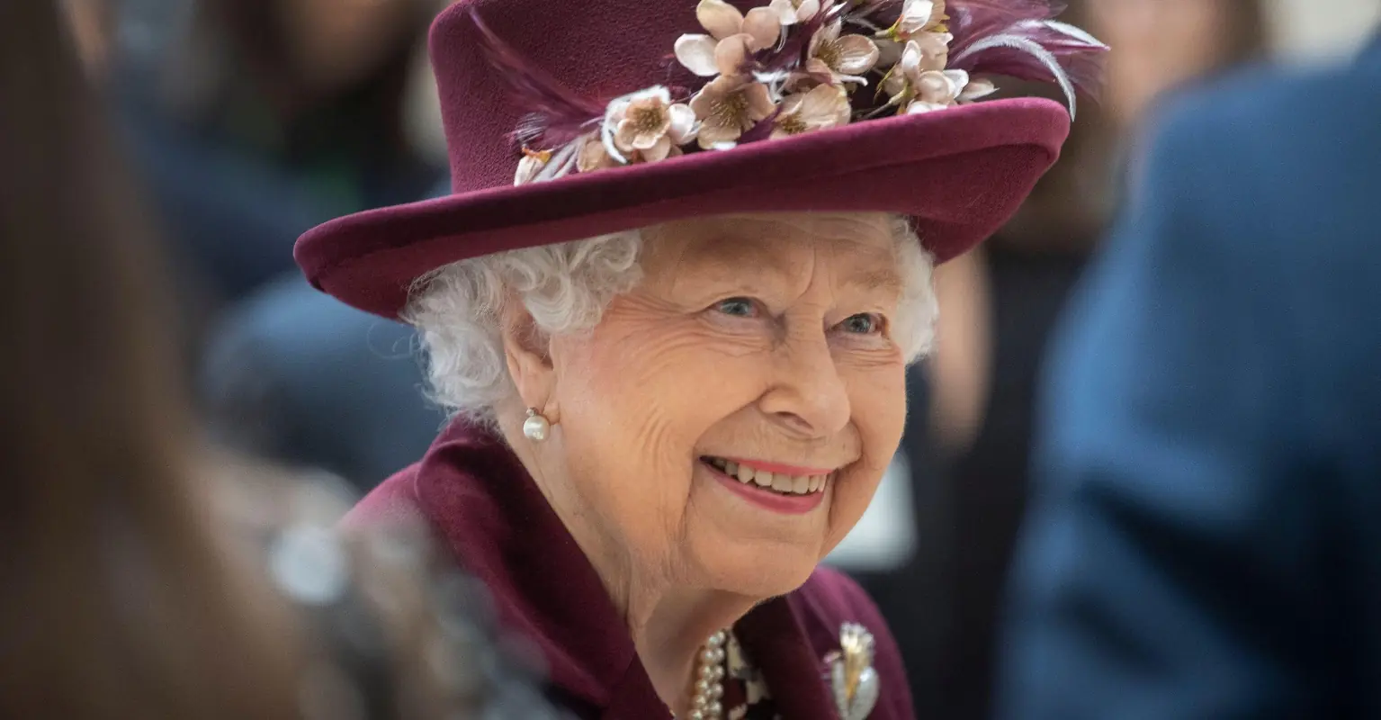The Queen is pictured smiling at first official engagement since Prince Philip's death