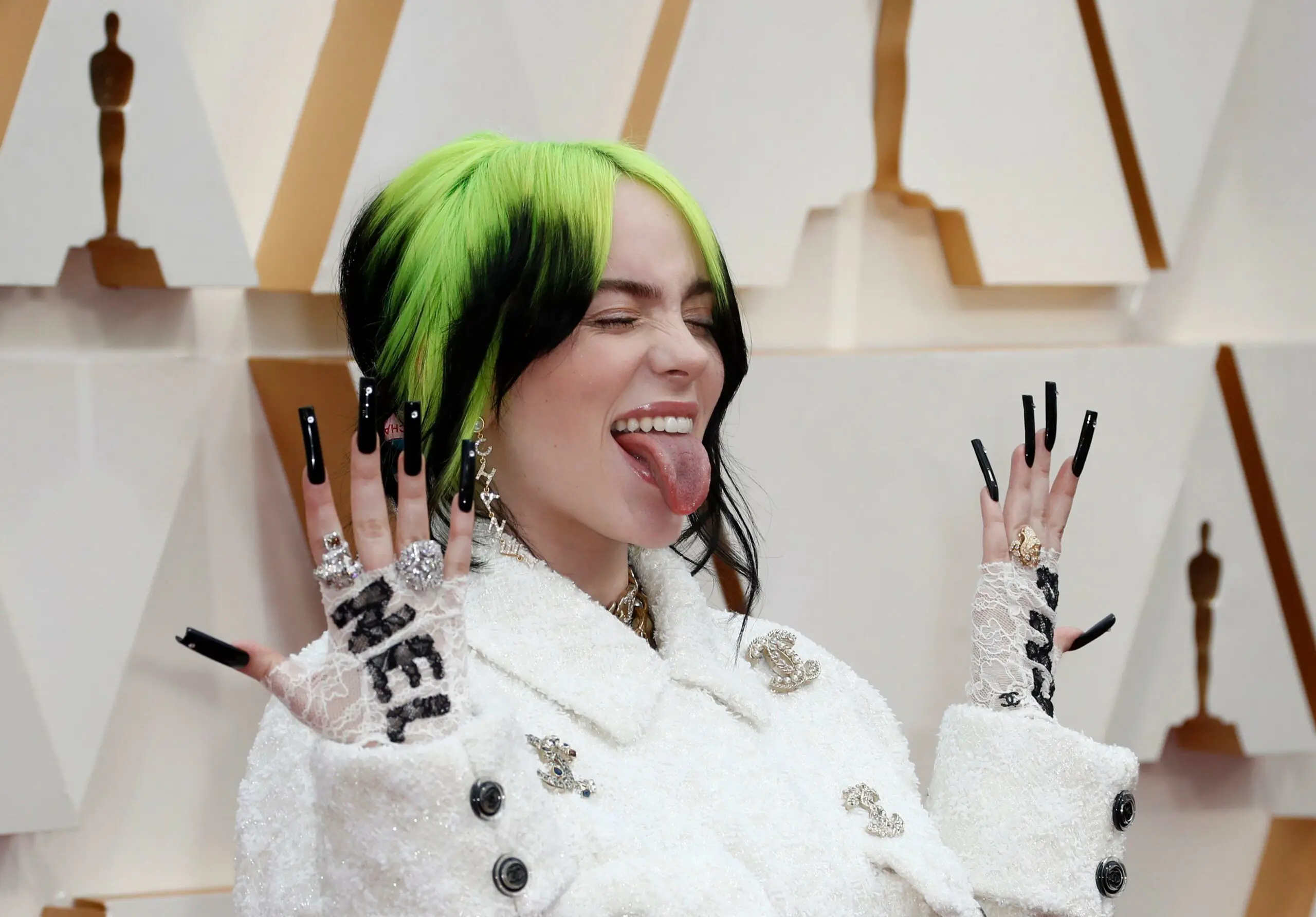 Billie Eilish talks body confidence and says she feels 'more like a woman' with blonde hair