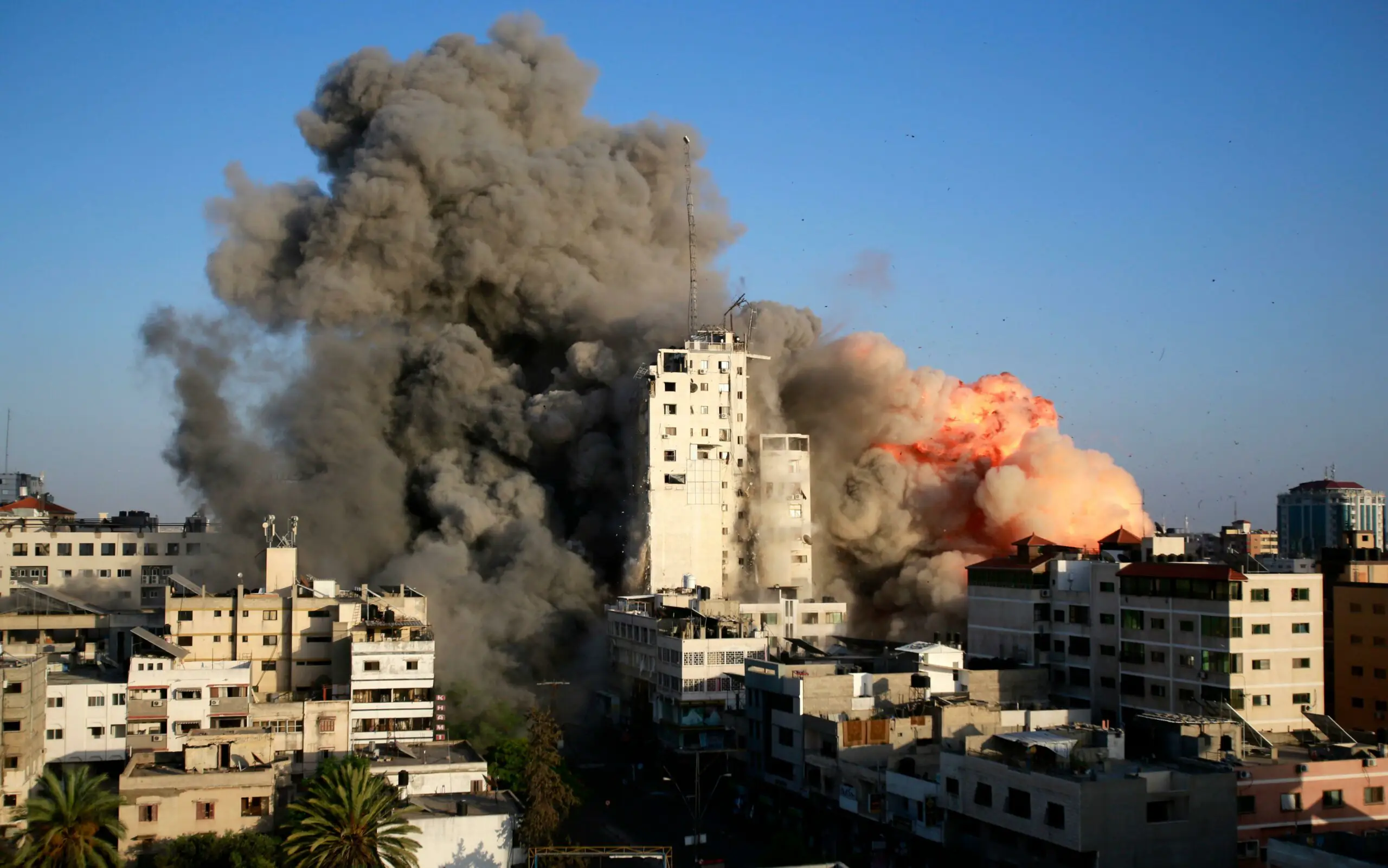 Israeli military says it's destroyed home of top Hamas leader as airstrikes kill 26 Palestinians