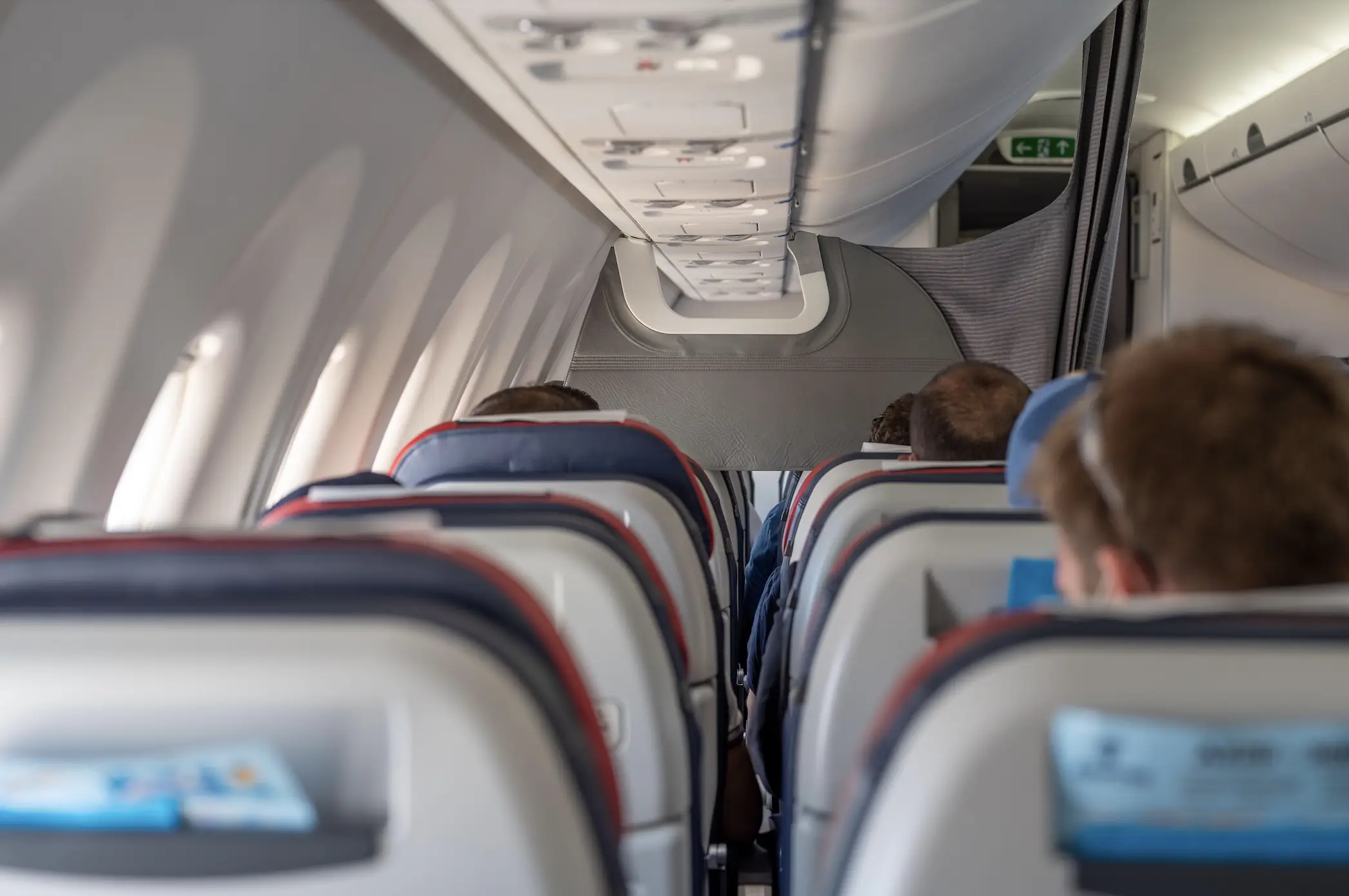 Passengers terrified as airplane's emergency exit door flies off moments before take-off