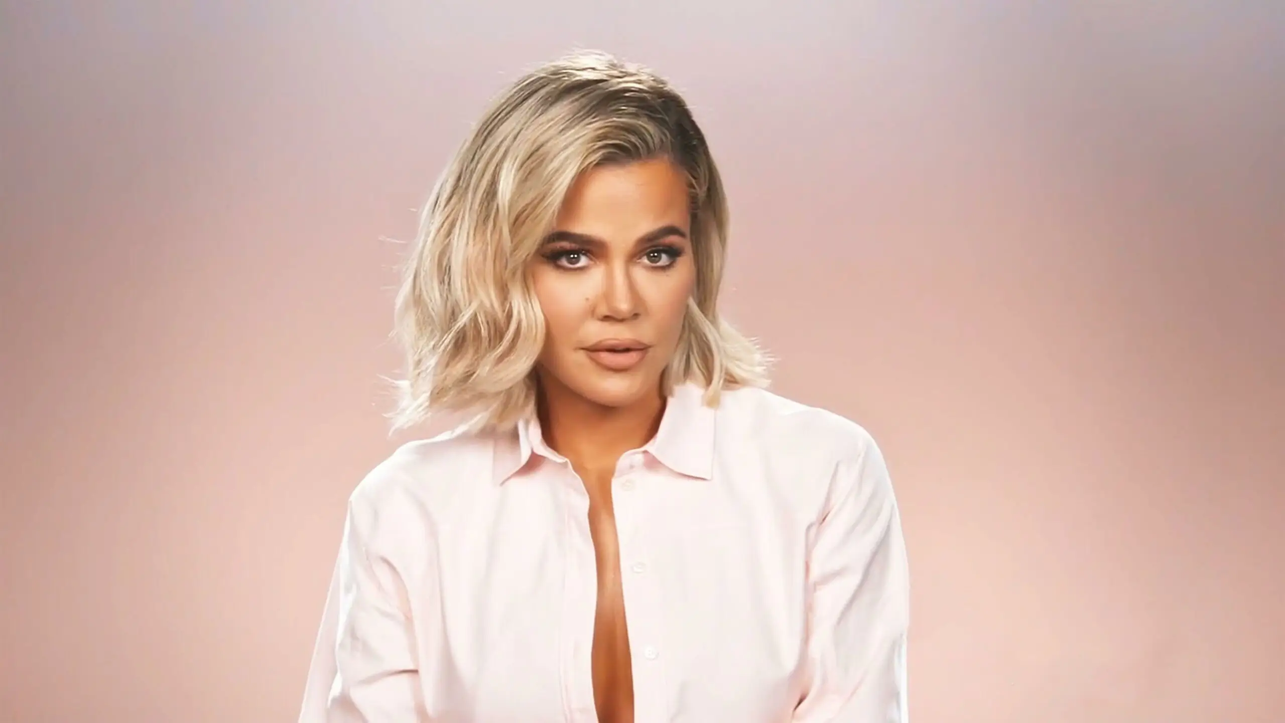 Khloé Kardashian calls Kanye West her 'brother for life' as she posts pic of him with Kim despite divorce