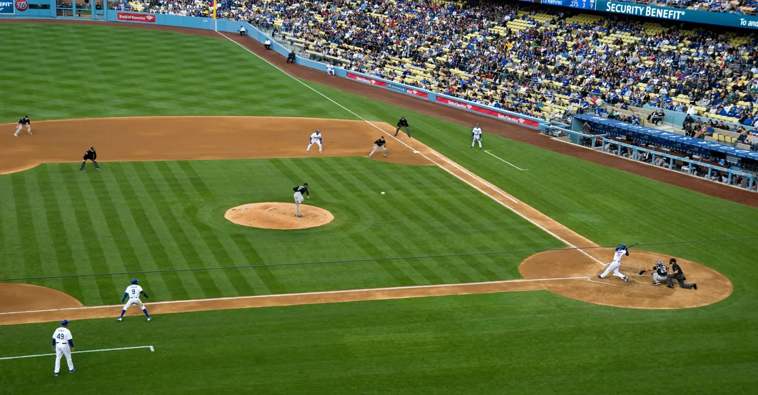 Dad drops baby, catches foul ball, then catches baby, and hardly spills a drop of beer
