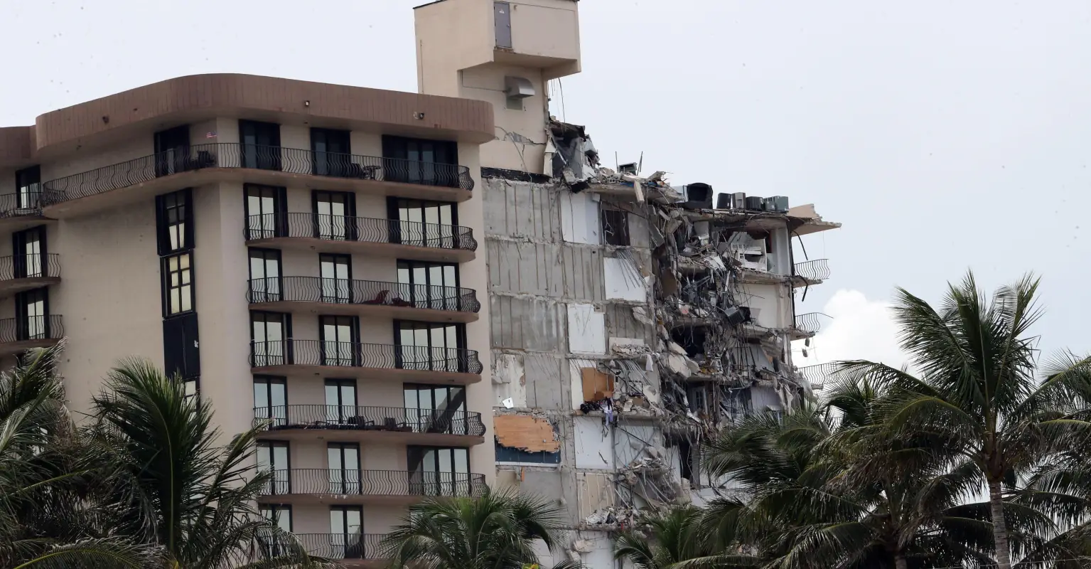 Official who signed off on Miami condo after 'shaking' concerns in 2018 is suspended as death toll hits 12