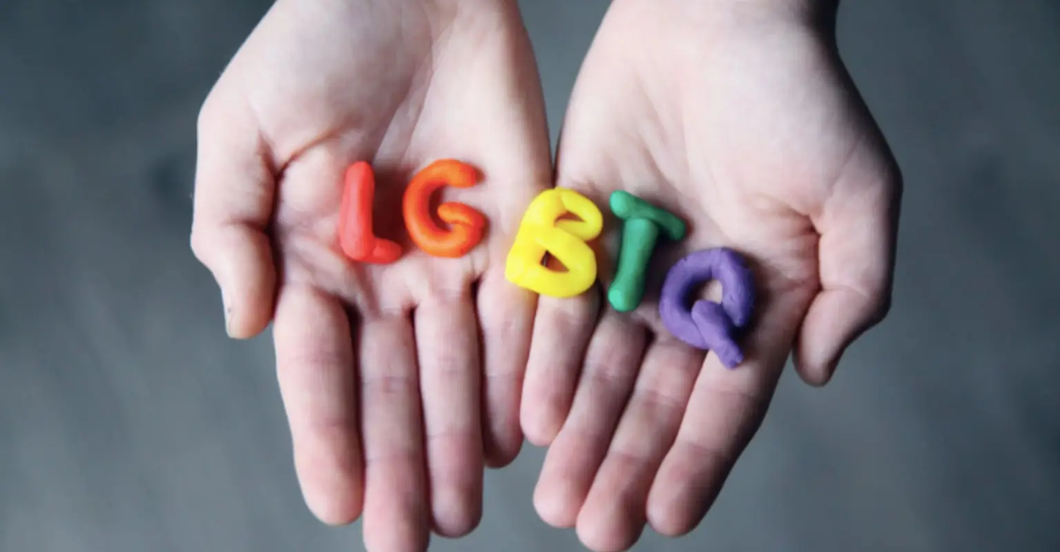 Trans woman confronts store owner over transphobic sign stating that trans women aren't women