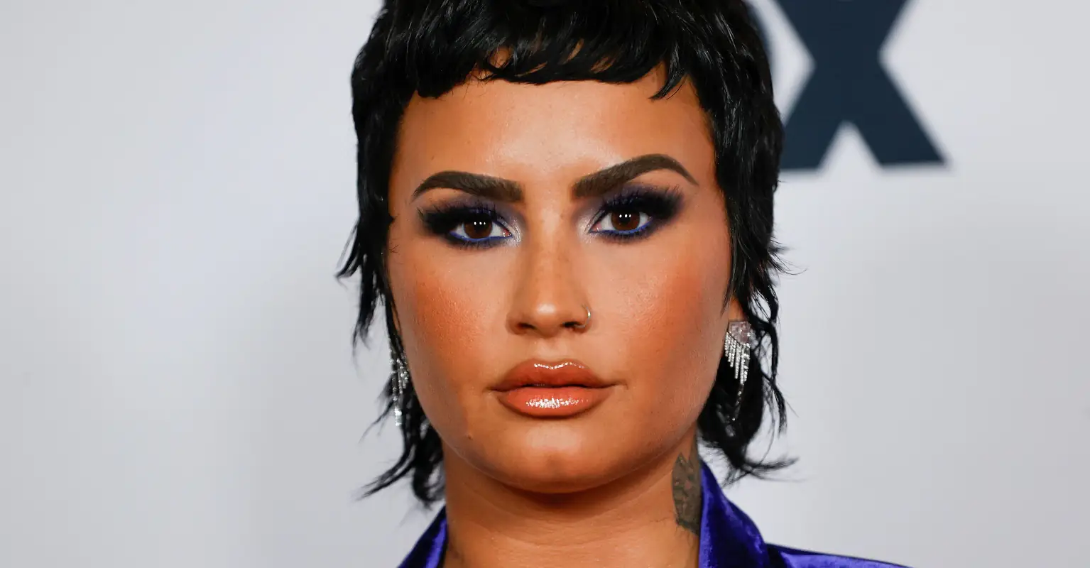 Demi Lovato debuts eye-catching new piercing next to new spider head tattoo