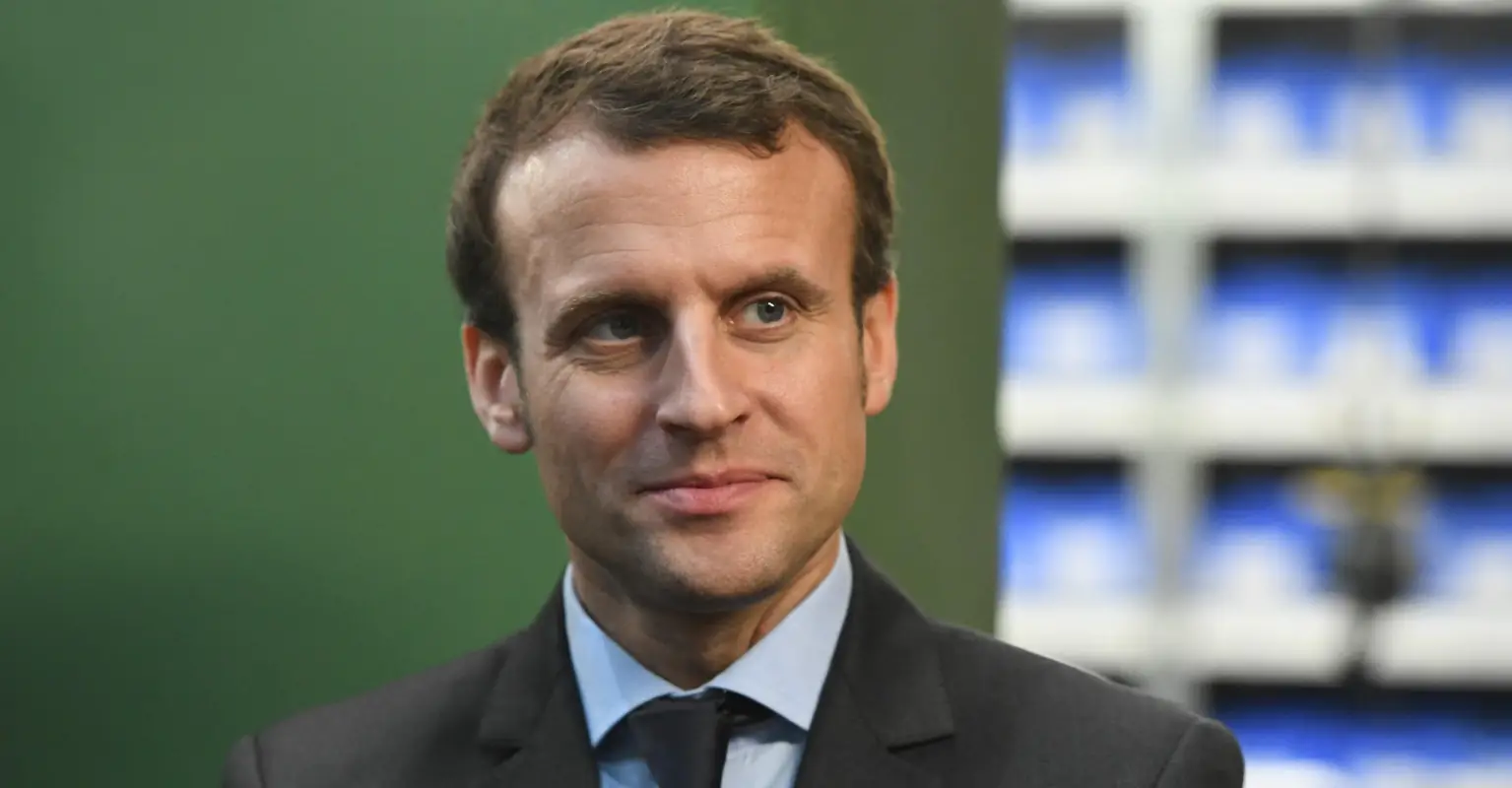 French President Emmanuel Macron slapped in the face during official visit