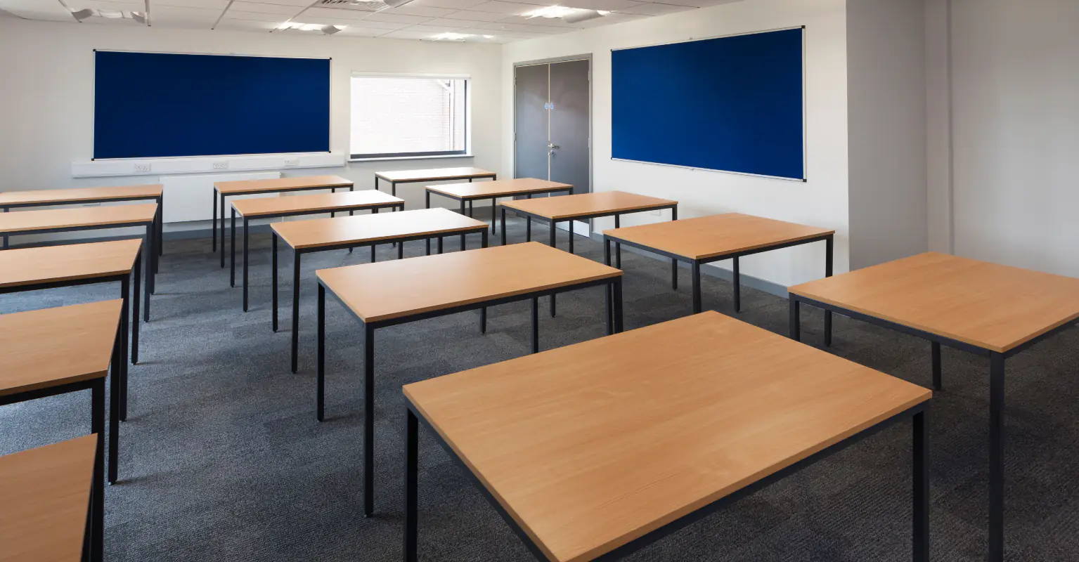 Ex-student, 25, 'storms into school with rifle and shoots principal in the back'