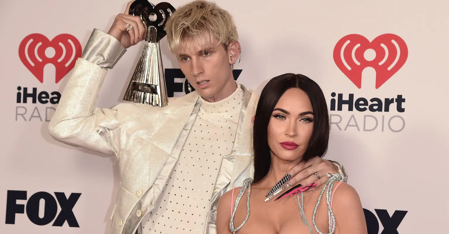 Machine Gun Kelly brands his and Megan Fox's new movie 'trash' as they skip premiere