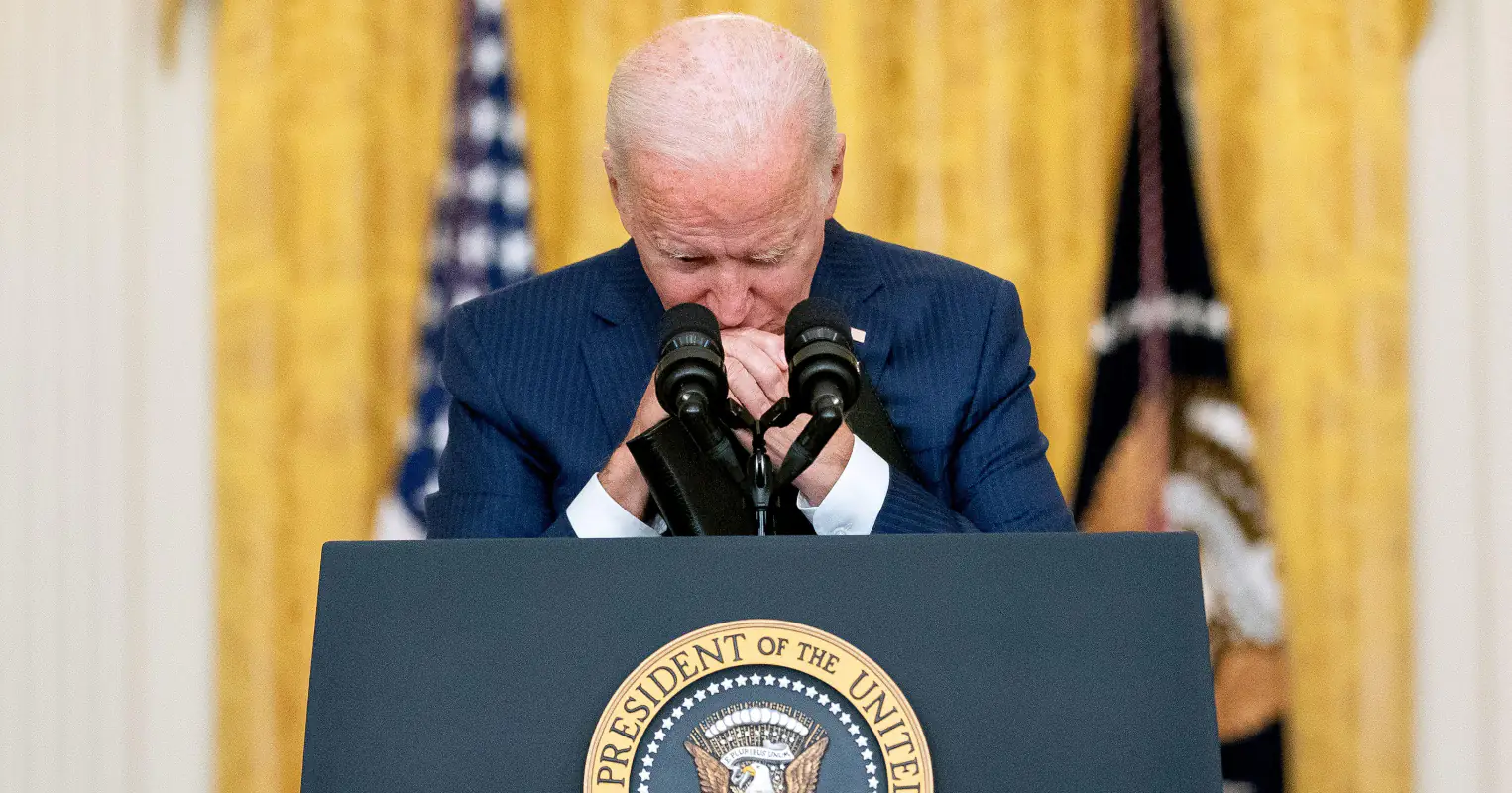 President Biden places head on his hands following tense exchange with Fox reporter