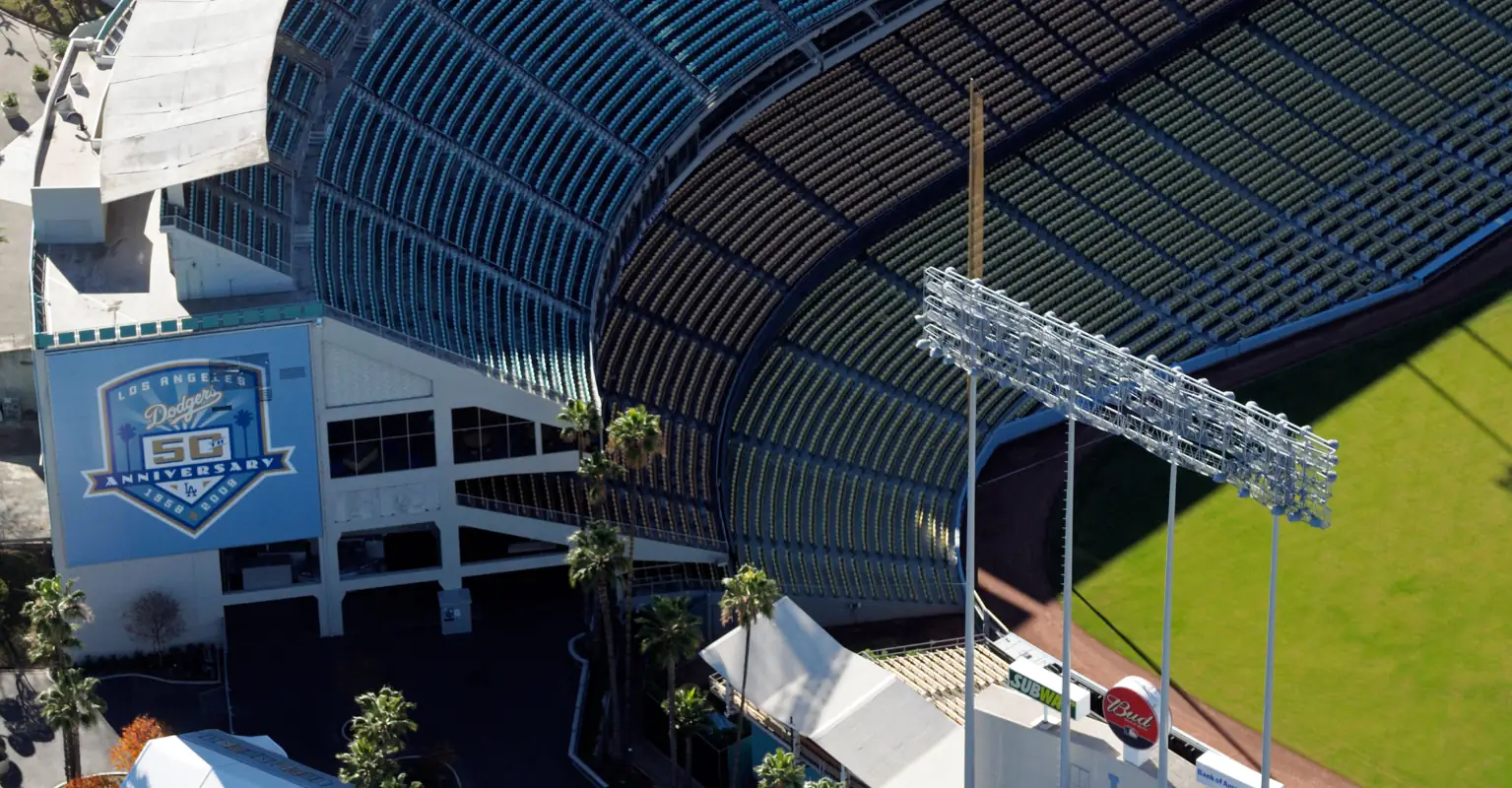 LA Dodgers ball girl branded a 'hero' after tackling field invader