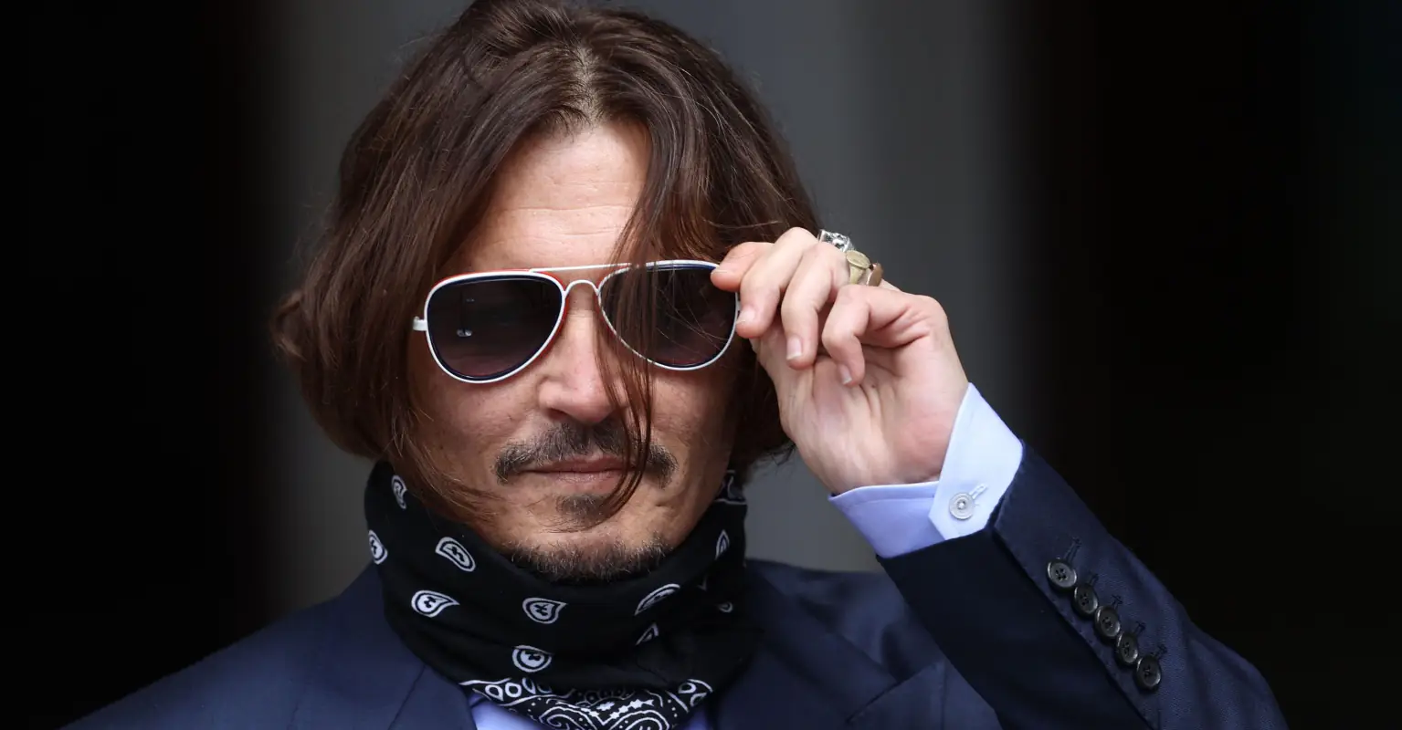 Johnny Depp says Hollywood is 'boycotting' him, but tells fans he will 'fight to the end'