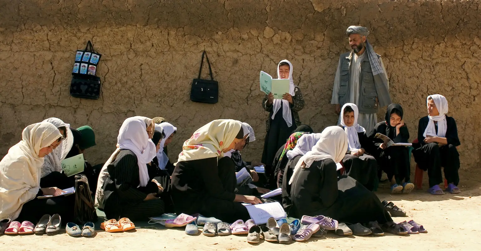 Taliban will allow Afghan women to attend university, but coed classes will be banned, education minister says