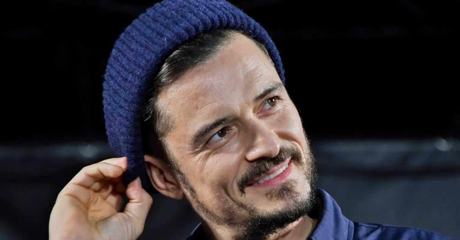 Orlando Bloom stuns fans as he goes paddleboarding with great white sharks