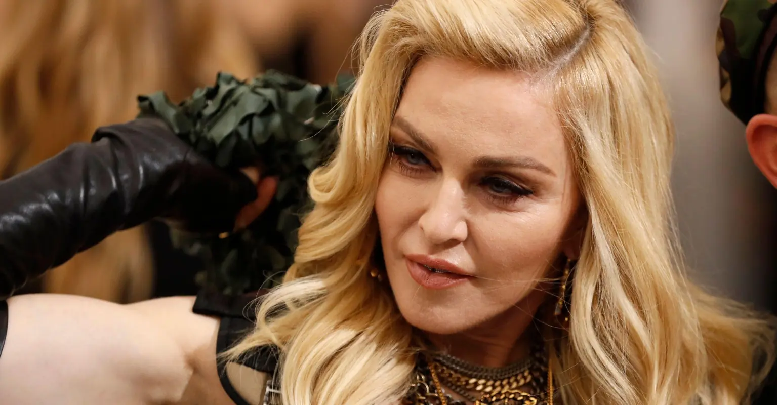 Madonna flashes audience and sprawls across Jimmy Fallon's desk during 'Tonight Show' interview