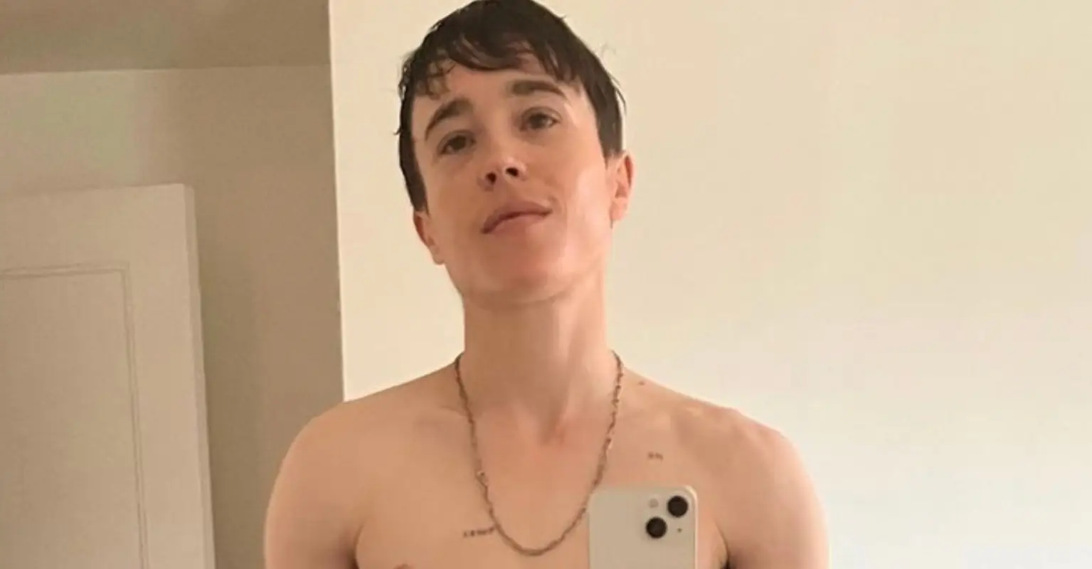 Elliot Page proudly shows off abs and chest as he jokes: 'My new phone works'