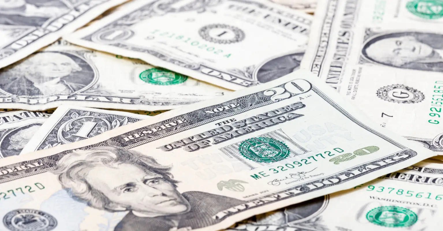 Chaos erupts on California freeway after armored truck spills tons of cash