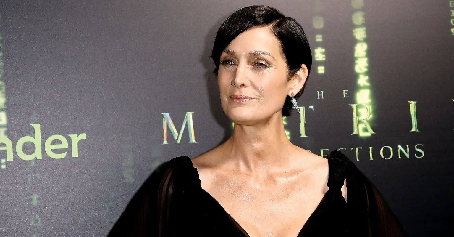Carrie-Anne Moss wows fans with impressive Matrix Code red carpet dress at premiere