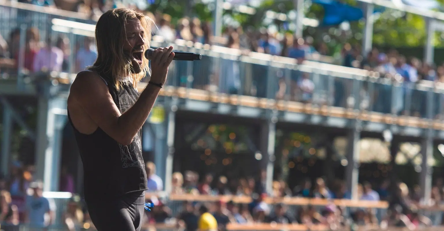 Video shows the moment crowd learns of Taylor Hawkins' death as they gather to watch Foo Fighters