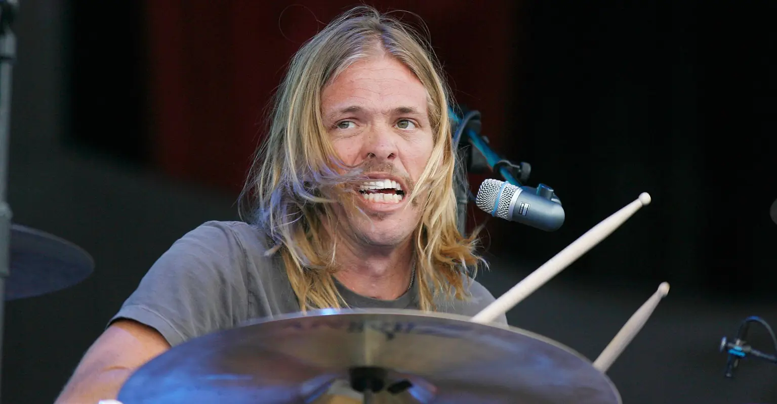 Tributes pour in for Foo Fighters drummer Taylor Hawkins who has died at the age of 50