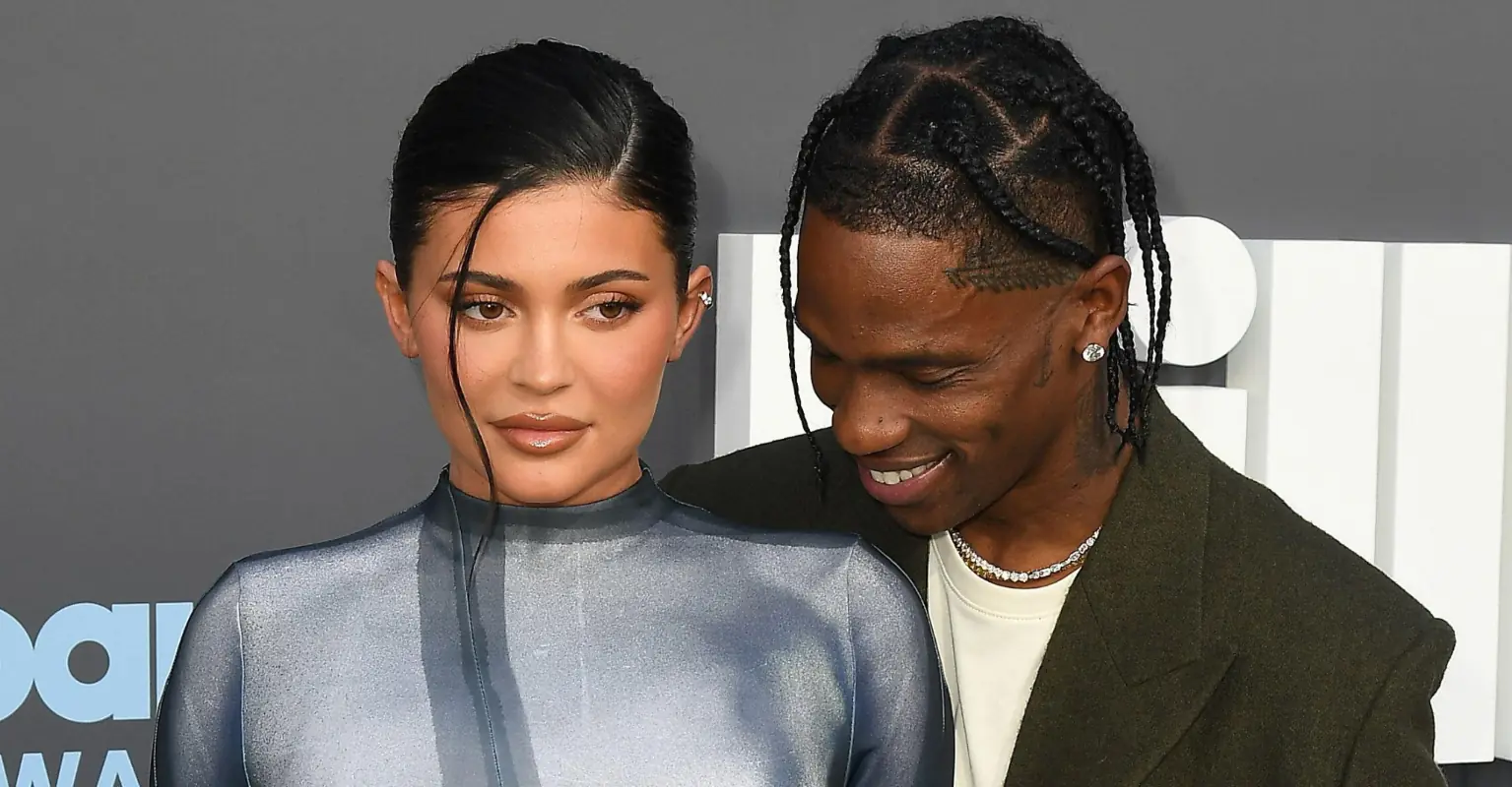 Fans react as Travis Scott dances with woman in bikini in front of Kylie Jenner and Stormi