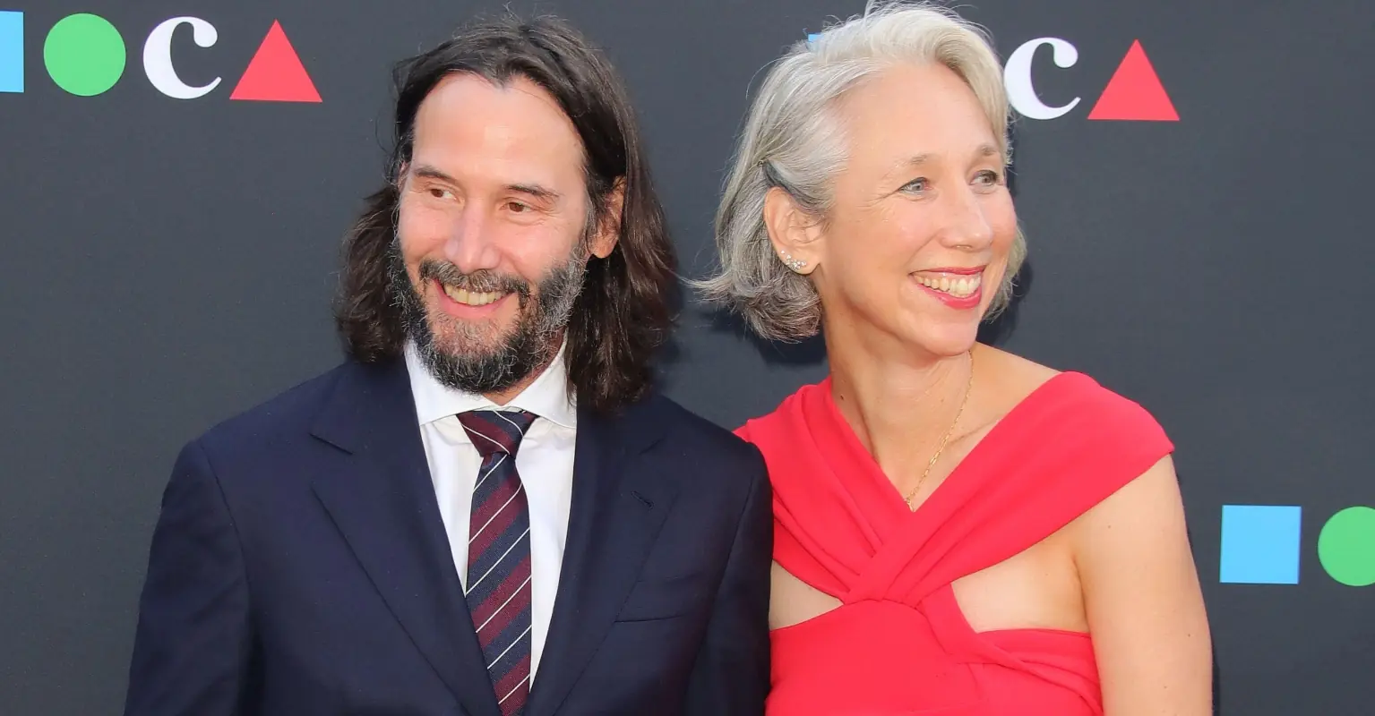 Keanu Reeves is all smiles as he makes rare public appearance with girlfriend