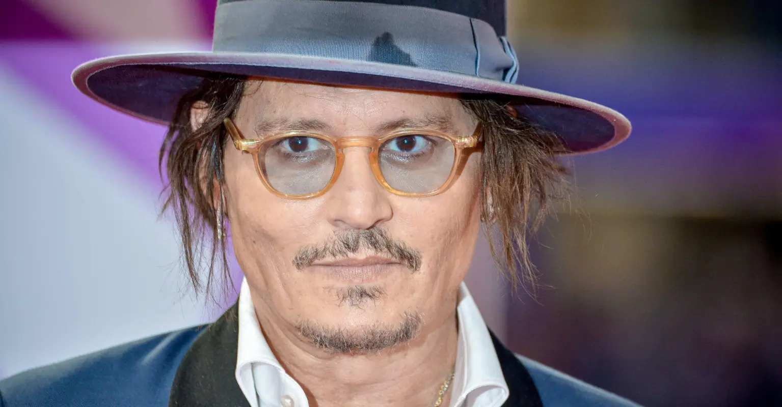Johnny Depp settles lawsuit with crew member who accused actor of punching him on set