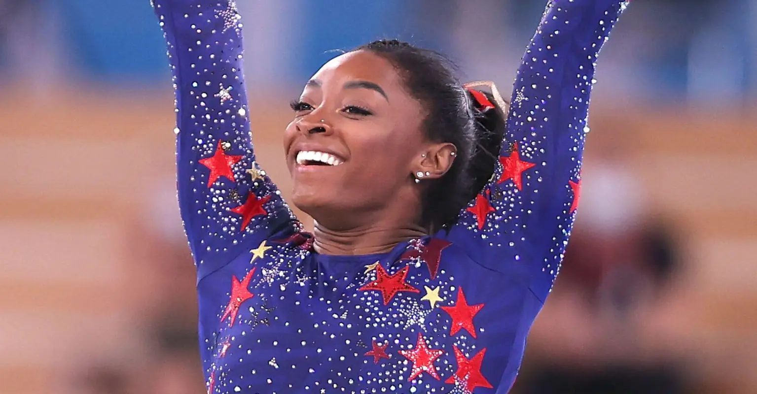 4ft8" Simone Biles offered a coloring book on recent flight