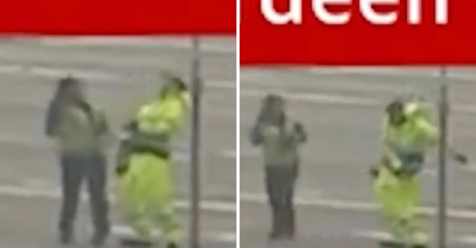 Investigation underway after airport staff spotted 'flossing' as nation awaited news of the Queen