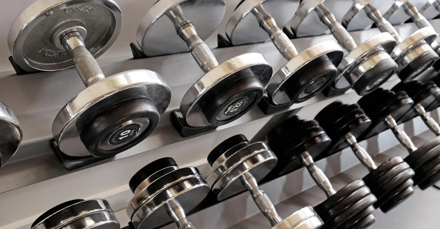 Woman forced to call 911 after getting stuck upside down in gym equipment