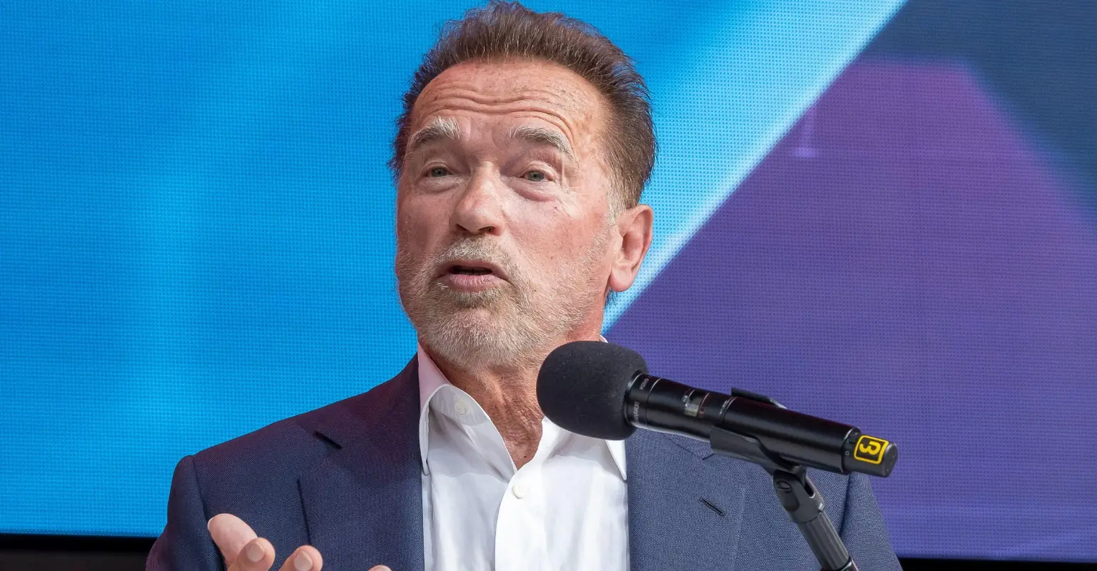 Arnold Schwarzenegger under fire for using catchphrase to sign Auschwitz book
