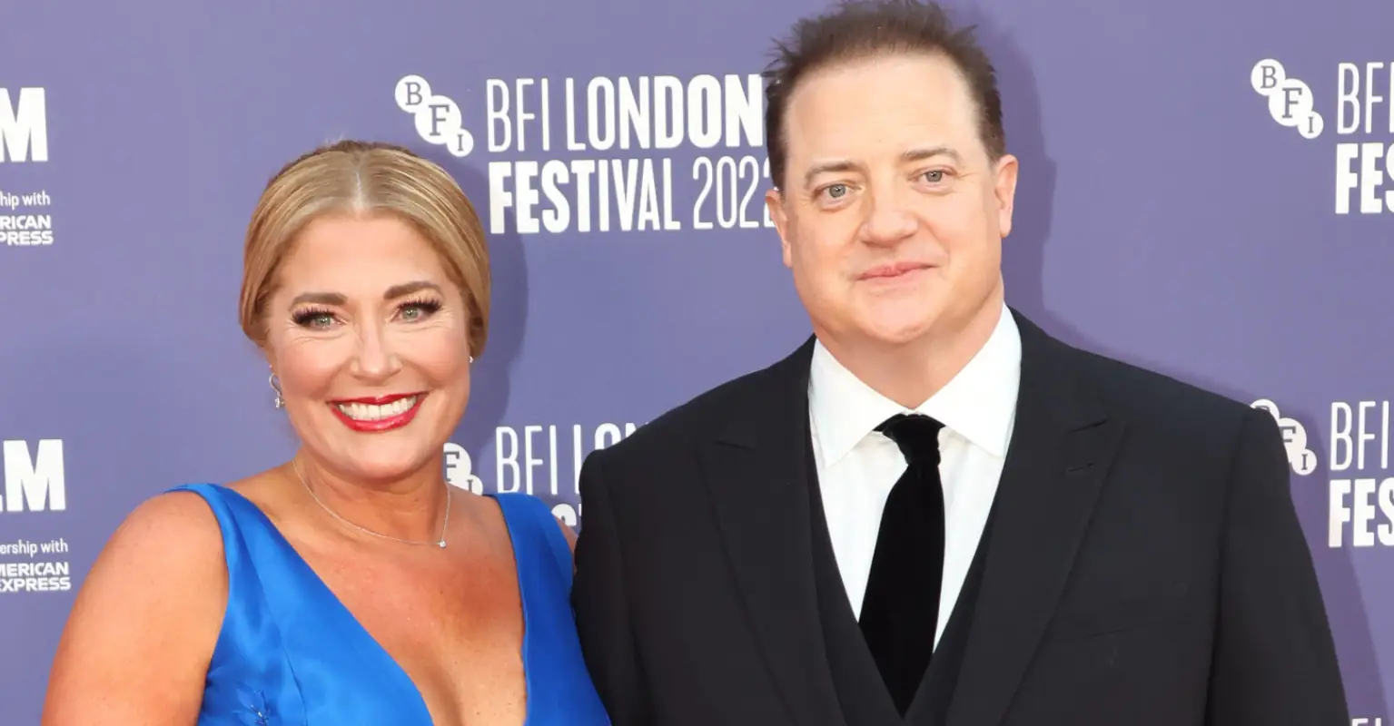 Brendan Fraser supported by partner Jeanne Moore on 'The Whale' red carpet