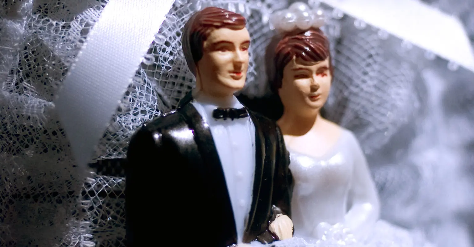 Couple roasted over raunchy wedding cake topper
