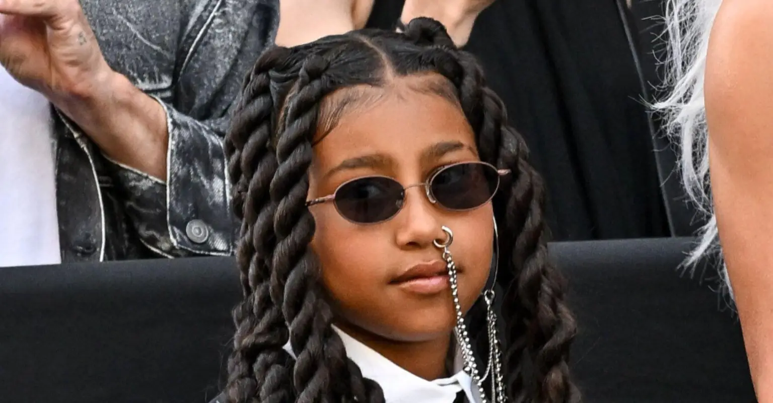 North West channels dad Kanye in full leather face mask