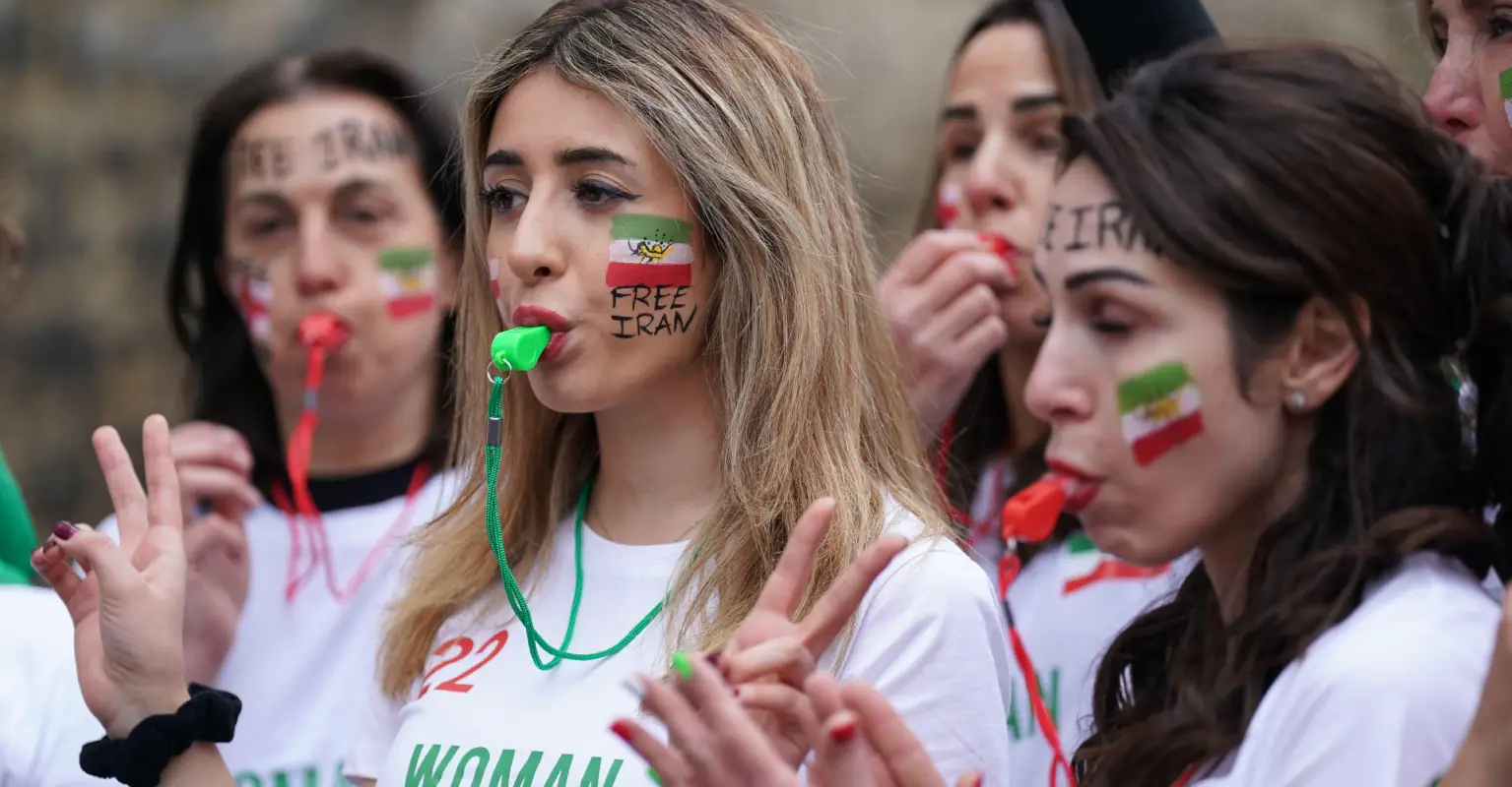 Iran fans boo their own national anthem amid protests in the country