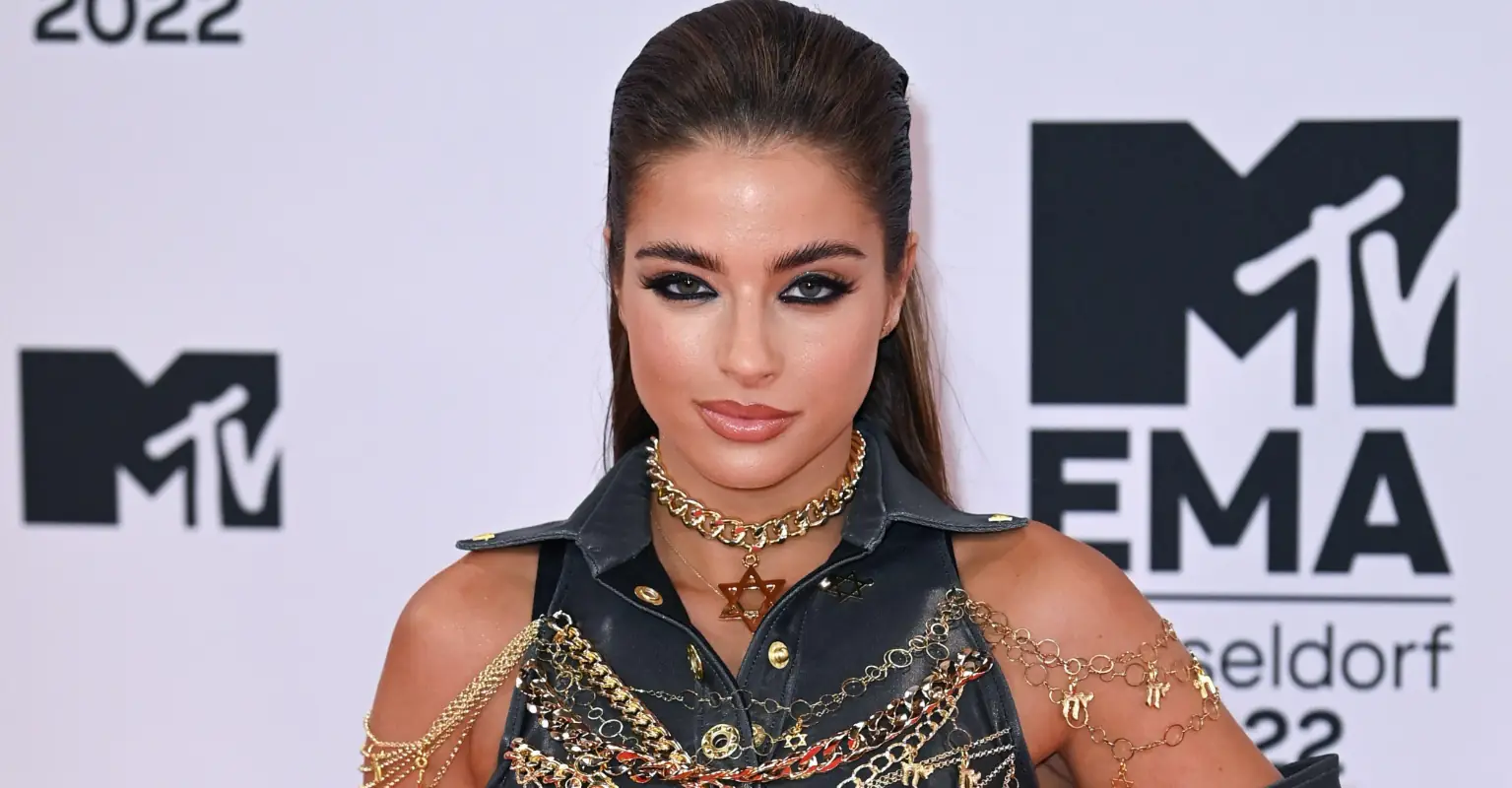 Singer Noa Kirel wears outfit with Kanye West's face on at MTV EMAs
