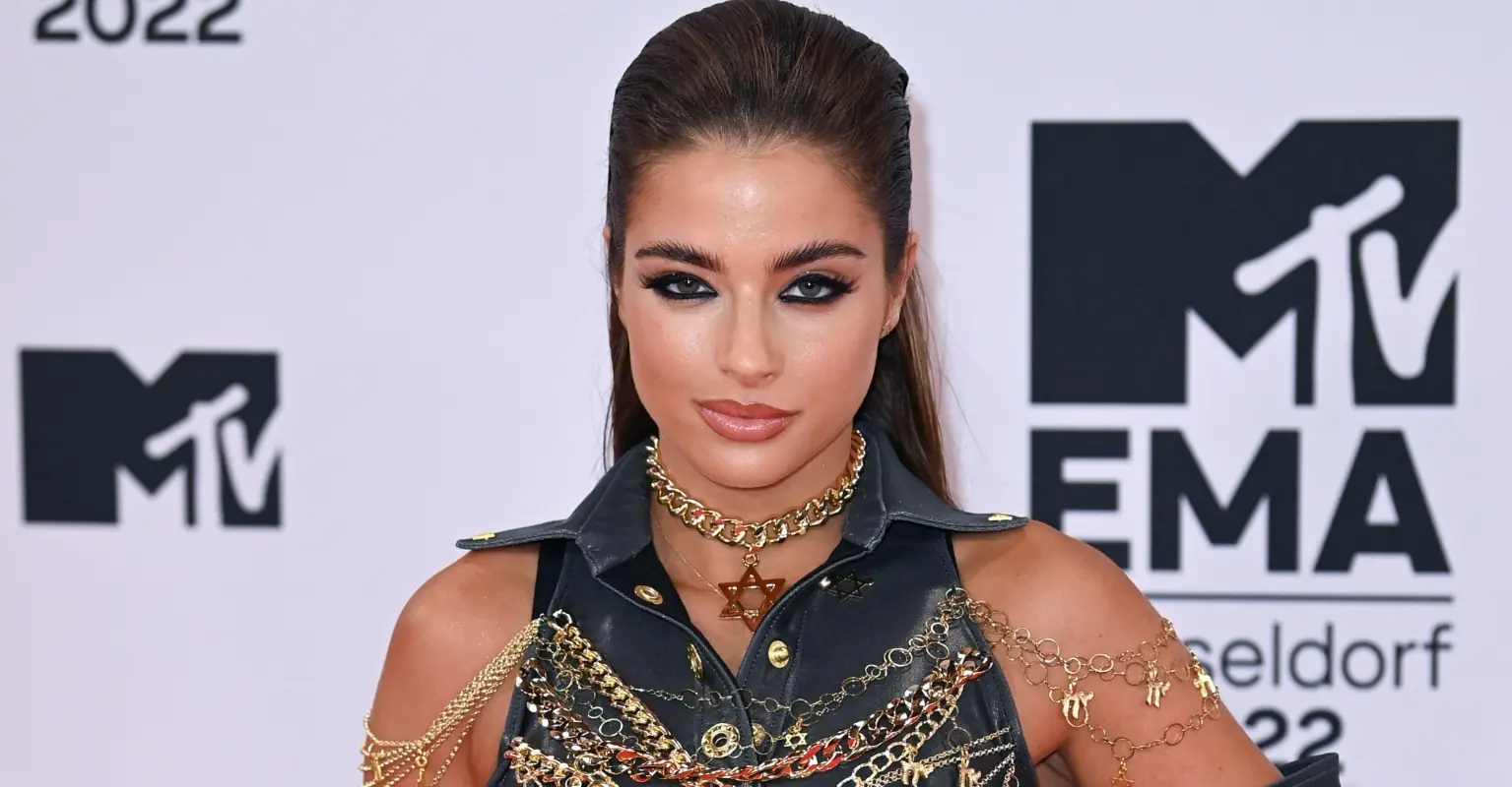 Singer Noa Kirel wears outfit with Kanye West's face on at MTV EMAs