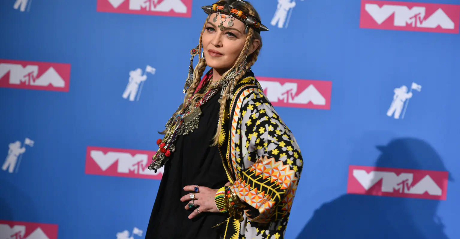 Madonna sparks concern after licking dog bowl and squatting over Sriracha sauce in new video