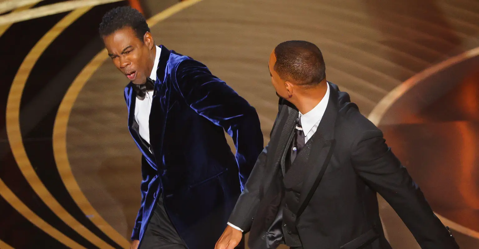 It took less than 15 minutes for Will Smith to be referenced at tonight's Oscars