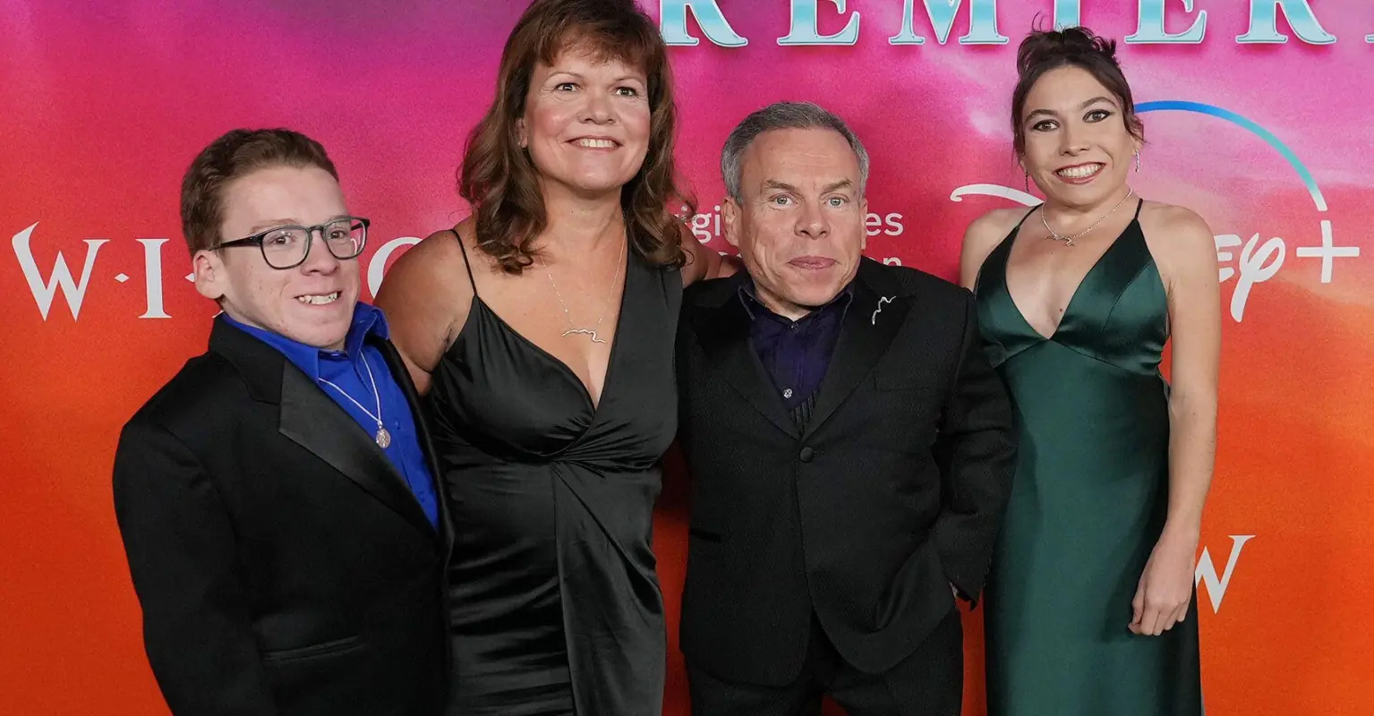 Warwick Davis arrives to red carpet with family - after nearly losing his wife to illness