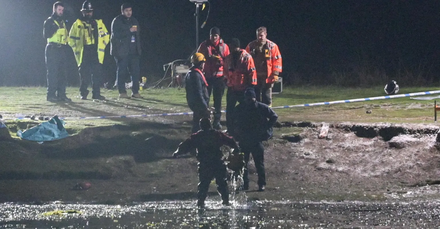 Three children die after falling through ice on lake as snow hits UK