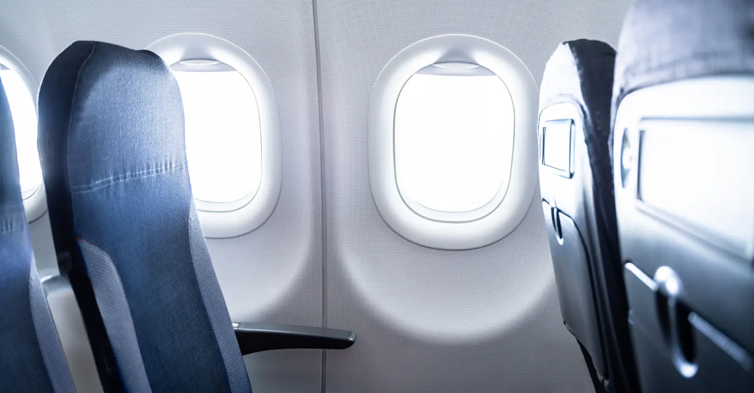 Influencer confronts man on plane after claiming he took a photo of her while she was sleeping