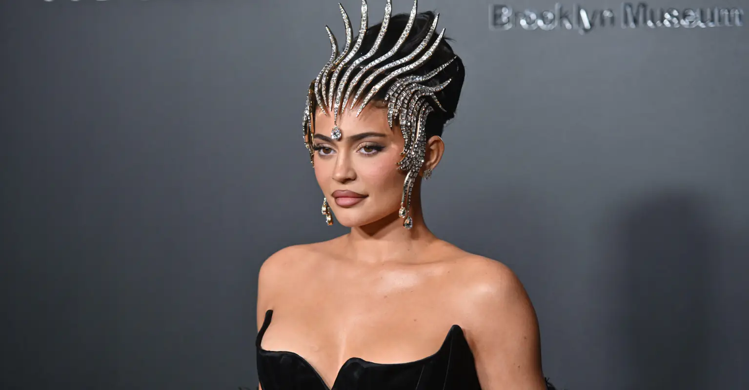 Kylie Jenner looks unhappy as Irina Shayk rocks up in the same 'lion head' dress